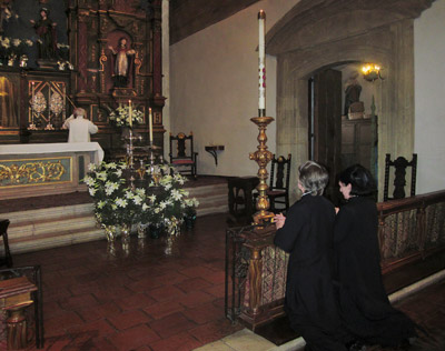 Praying in Carmel Mission
